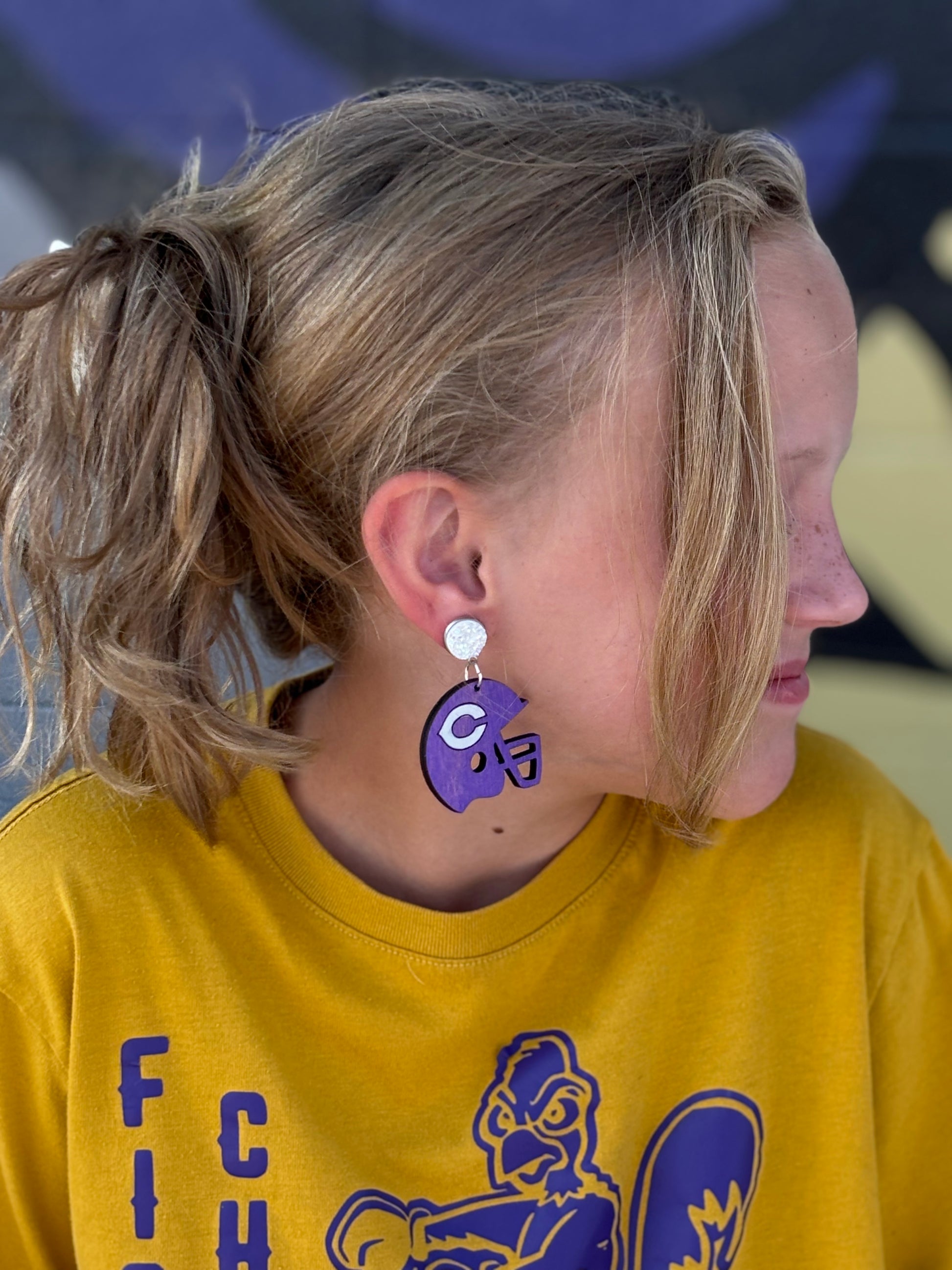 blonde in a football helmet Chick C Football Helmet – The Purple Chick