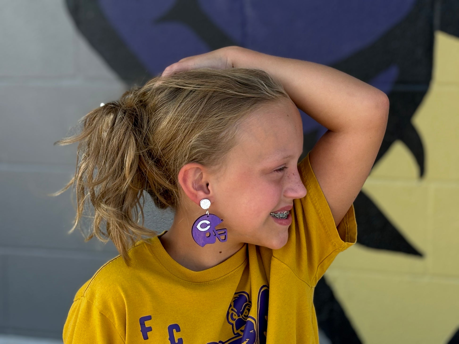 blonde in a football helmet Chick C Football Helmet – The Purple Chick